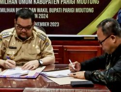 Pj Bupati Richard Tandatangani NPHD Dengan KPU Parigi Moutong