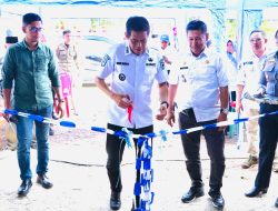 Harmoni Pembangunan di Bawah Langit Mepanga: Erwin Burase Resmikan Rest Area Ogomolos, Salurkan Bantuan Pangan, dan Kukuhkan Kades PAW